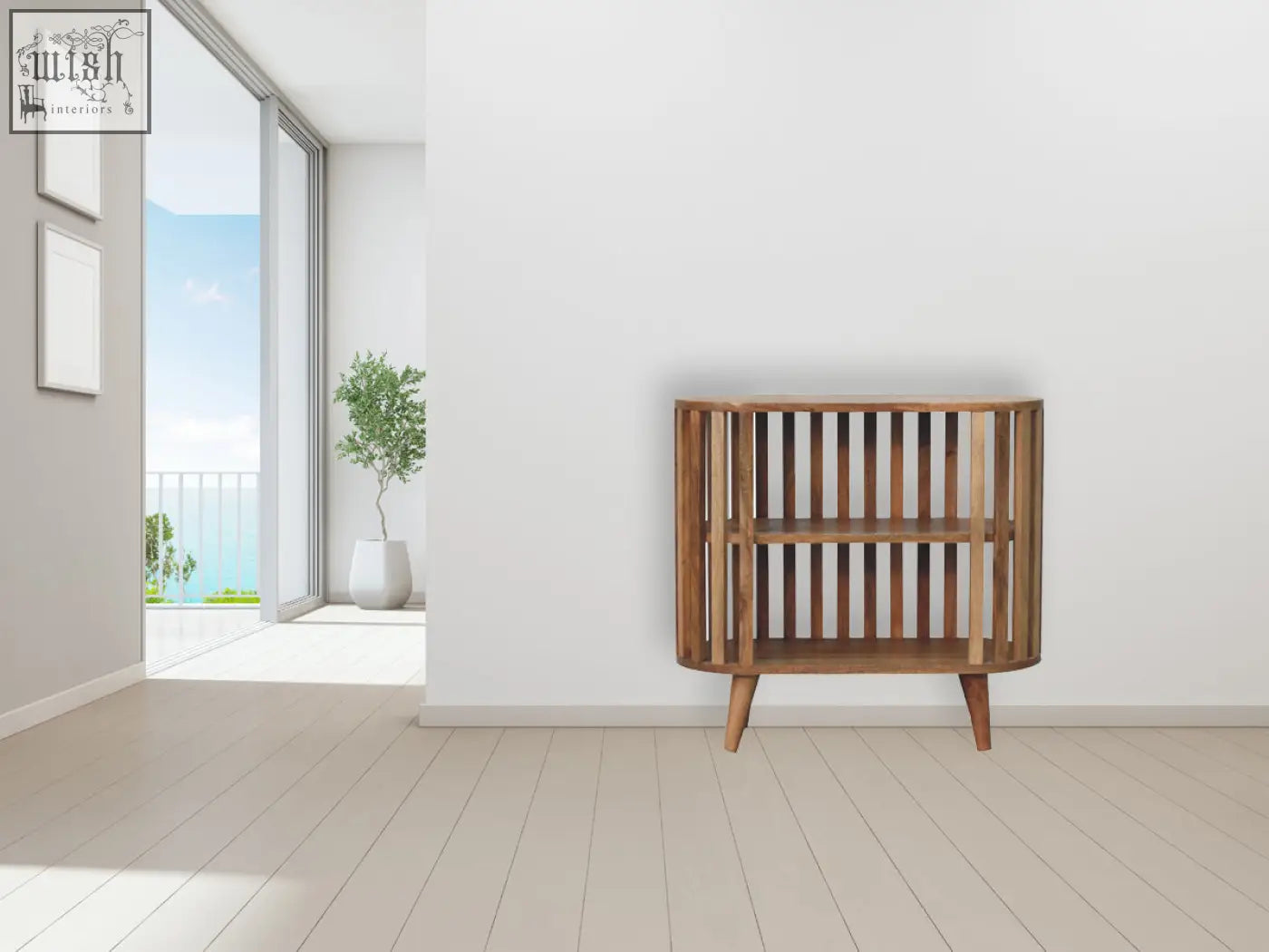A sleek ariella chest of drawers with curved wooden mango wood slats and an oak-ish finish with tapered legs