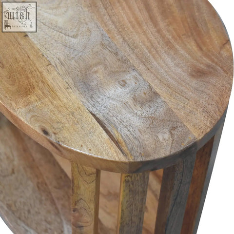 Ariella single shelf reclaimed wood oval side table with rustic natural finish and visible grain patterns