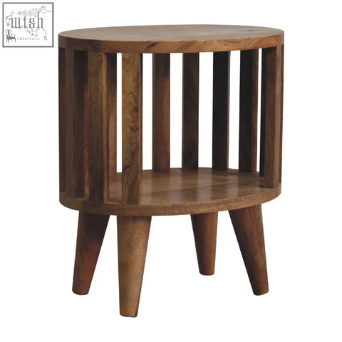 Round wooden ariella single shelf bedside table with vertical slats and tapered legs for stylish storage