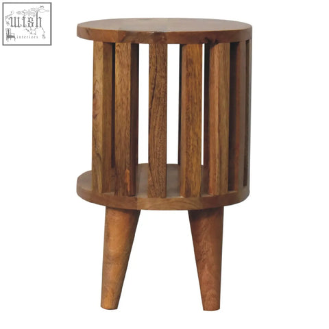 Rustic wooden ariella single shelf bedside table with vertical slats and tapered legs for bedroom use