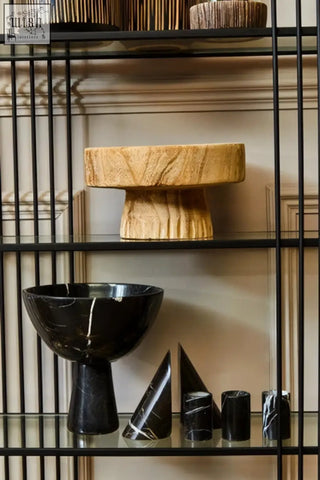 Arlo natural engraved round bowl in sleek black marble with glossy finish and subtle white veining on glass shelf