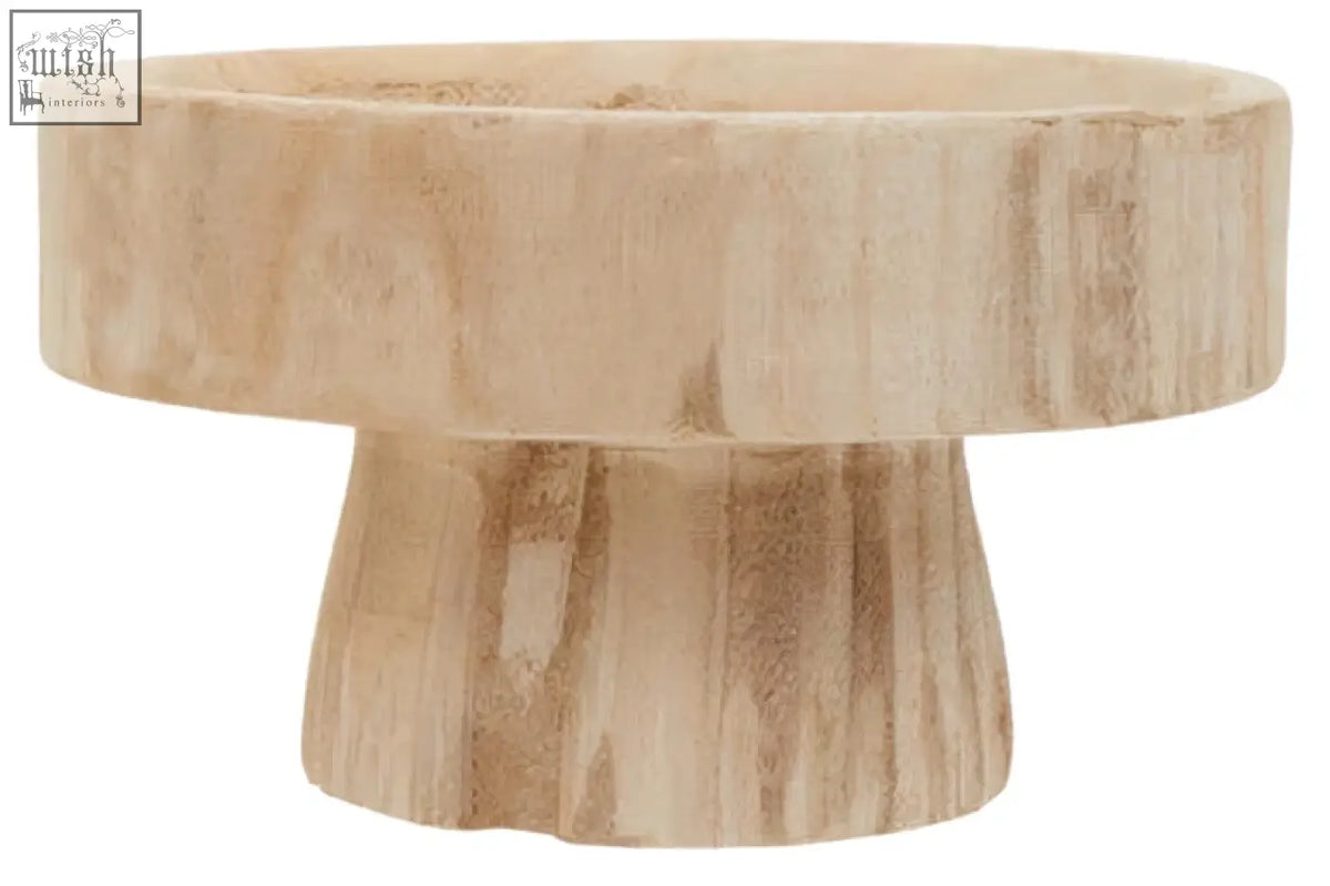 Light-colored wooden engraved round bowl with natural rustic finish and slightly textured surface for serving