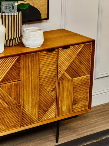 Wooden sideboard with small engraved natural woven-patterned doors in warm honey-toned finish