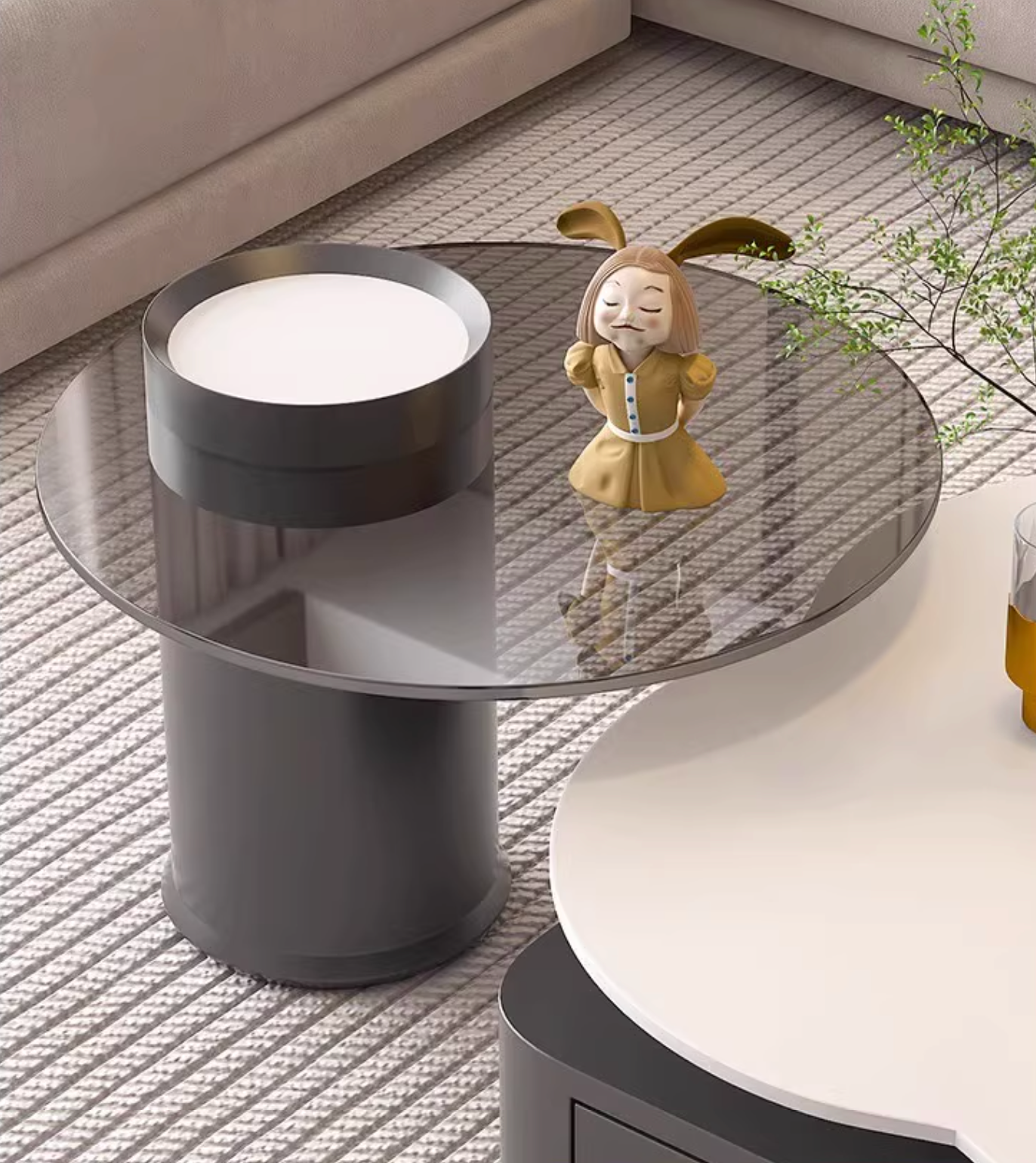 Modern aroma flower nesting coffee table with white glass top and sleek dark gray cylindrical base design