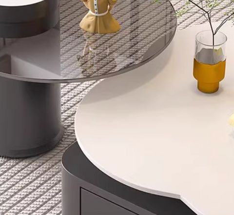 Modern aroma flower nesting coffee table with two-tier white top and matte black cylindrical base for living room
