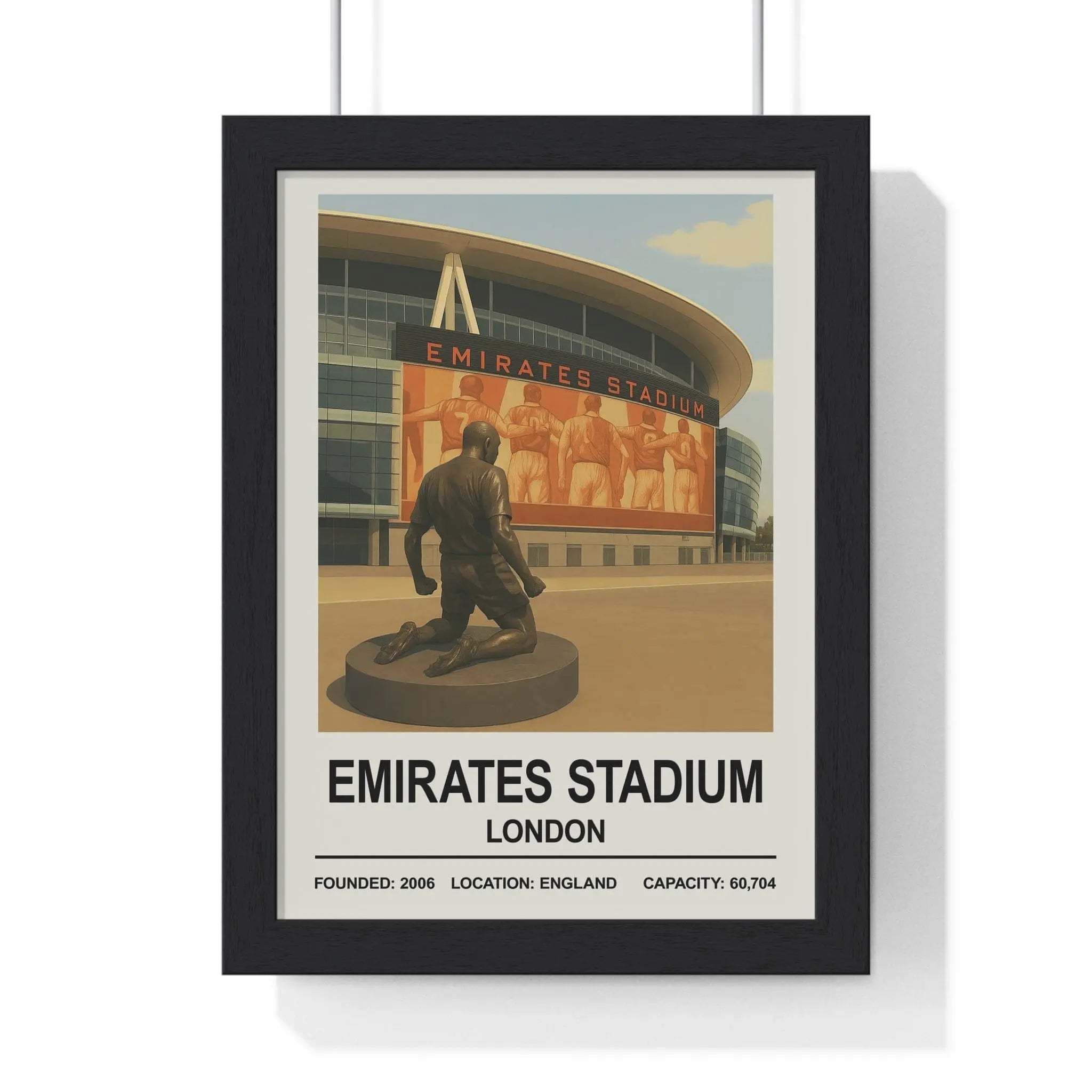 Black-framed Arsenal Emirates Stadium print with vintage emirates stadium London illustration and bronze footballer statue