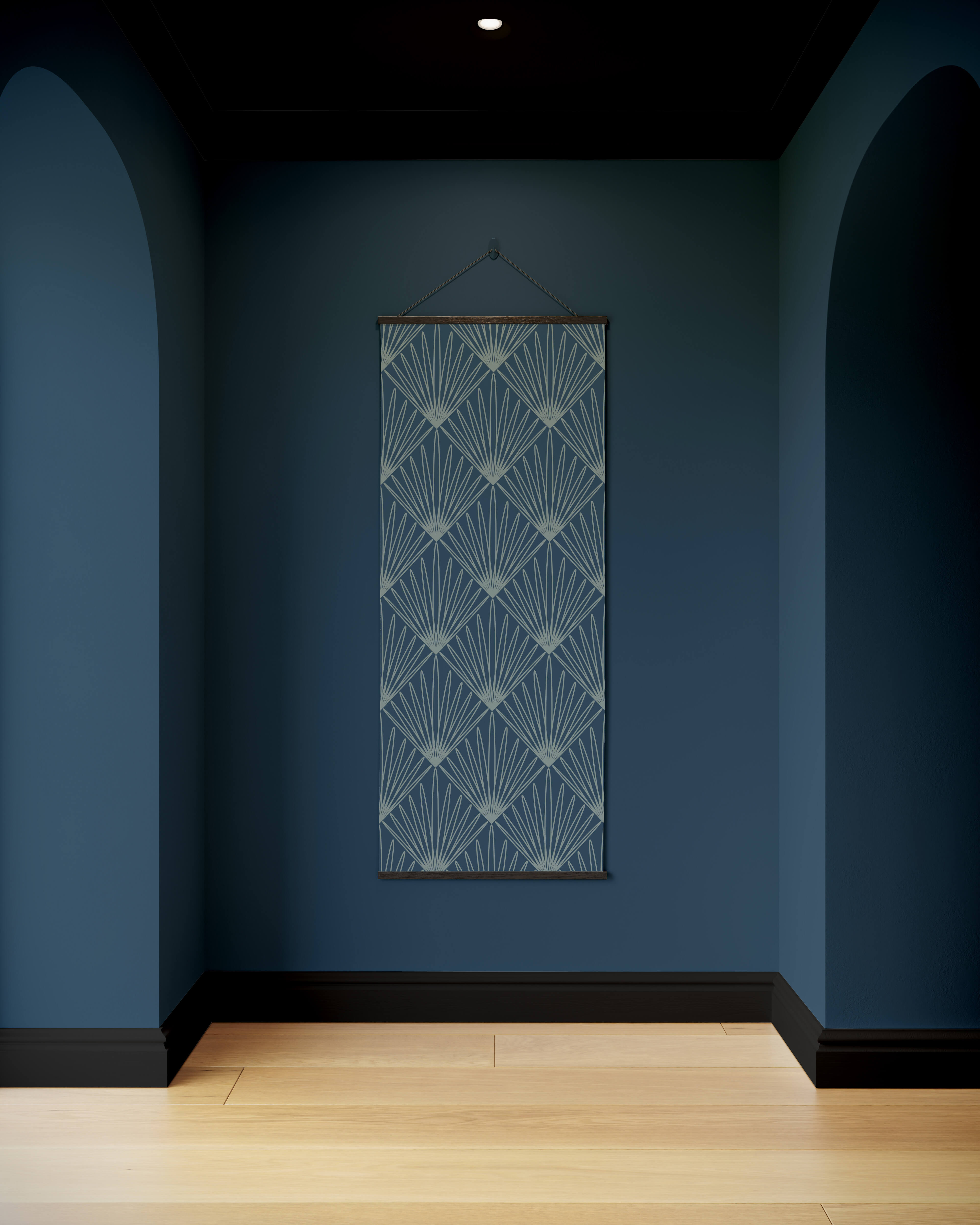 A rectangular art deco burst tapestry with a light blue and white geometric fan pattern in a dark wood frame