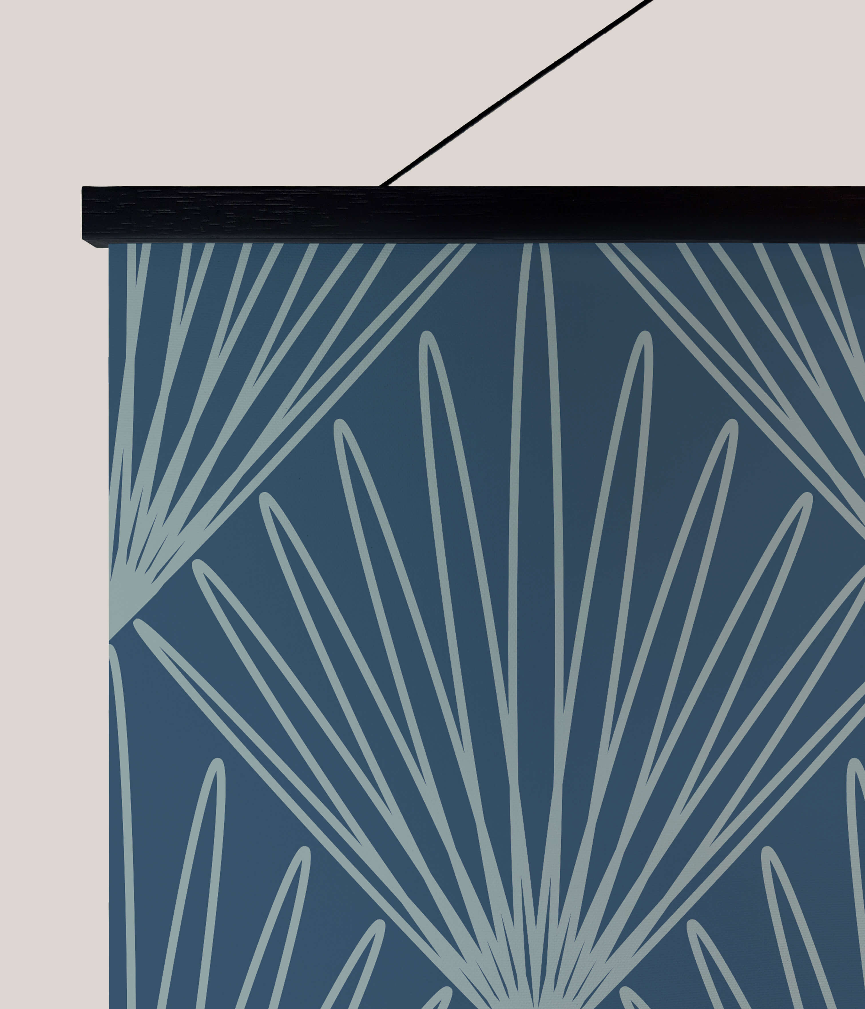 Blue wall hanging with light gray fan shapes on dark blue background framed in black art deco burst deco burst tapestry