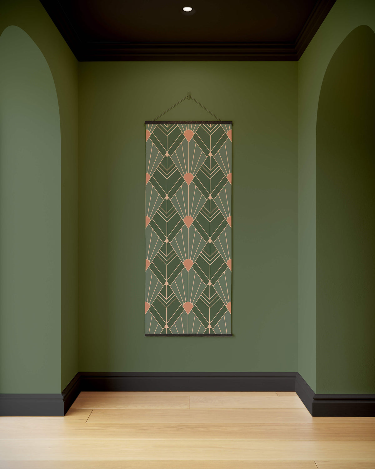 A rectangular art deco diamond pattern tapestry with green and peach geometric design framed in black