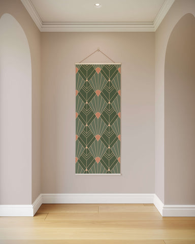 A green and rose gold art deco diamond pattern tapestry wall hanging with a white border