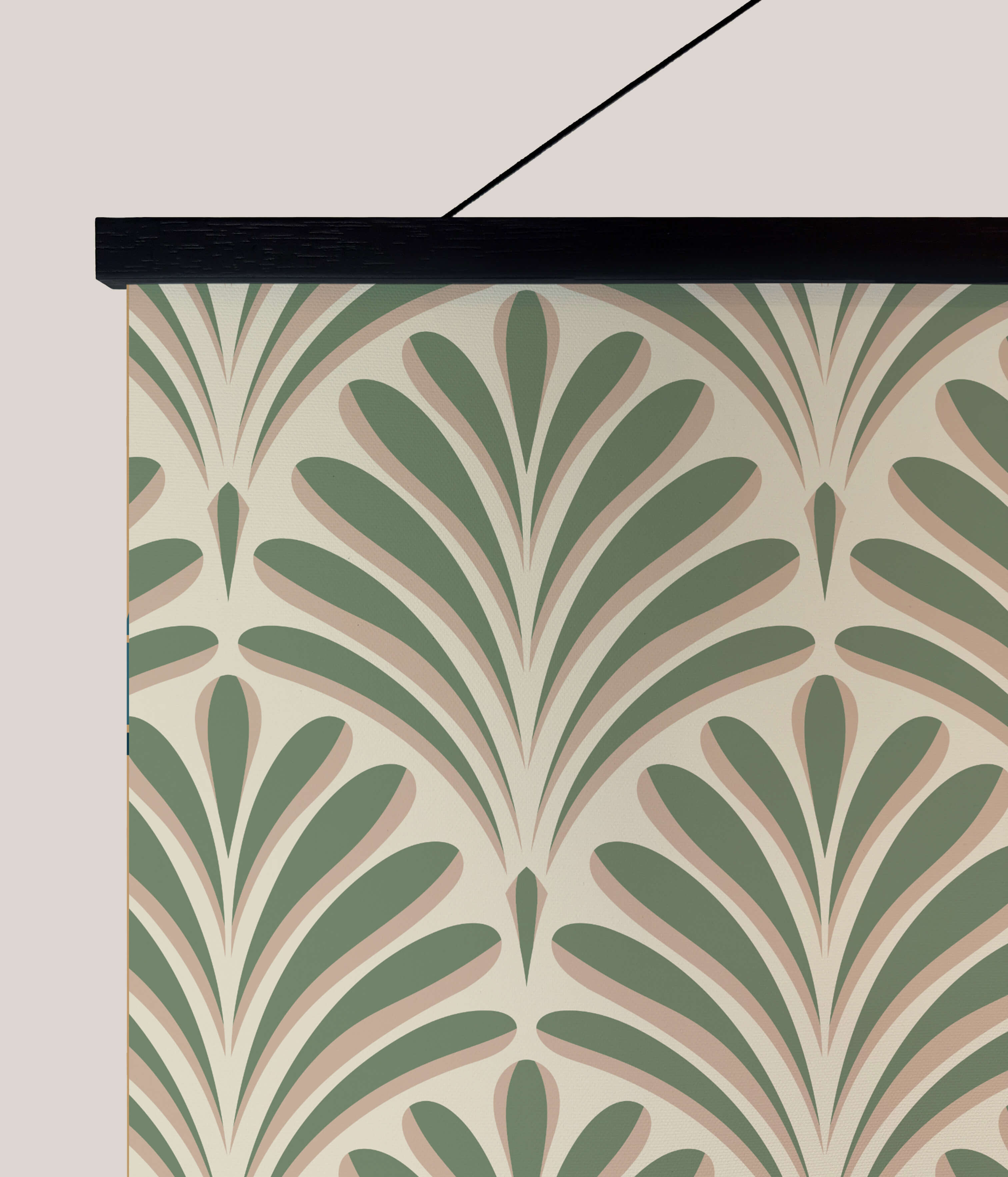 A framed art deco fan tapestry with a repeating green and beige leaf pattern on an off-white background
