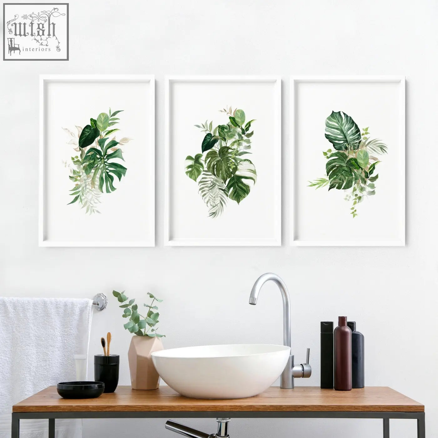Three framed tropical wall prints with lush green leaves in white frames perfect for bathroom walls uk