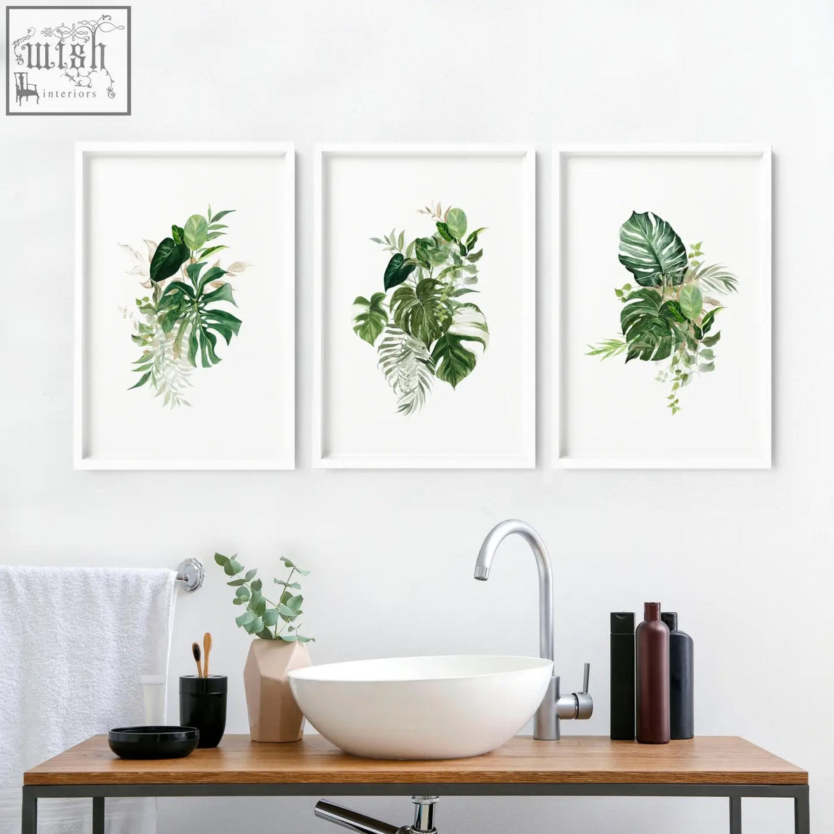 Three framed tropical wall prints with lush green leaves in white frames perfect for bathroom walls uk