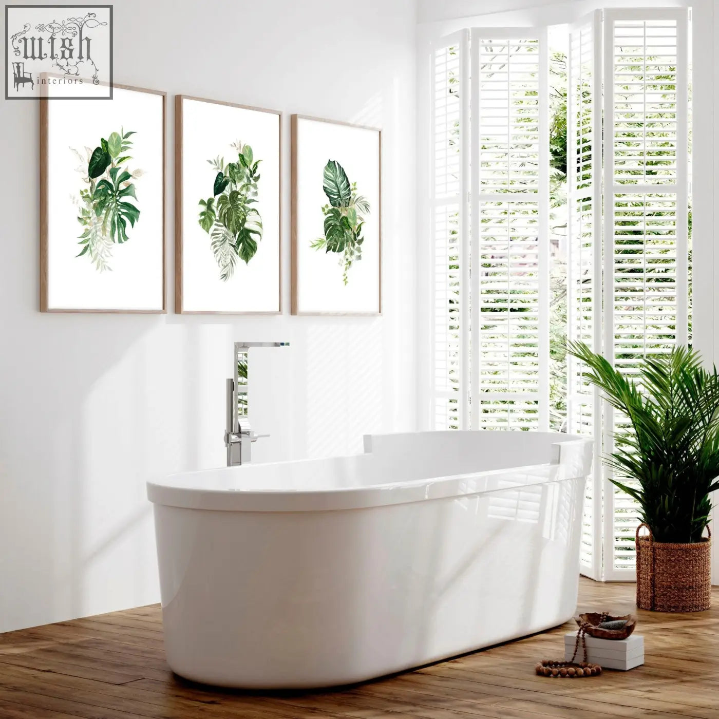 White freestanding bathtub with chrome faucet next to art for bathroom walls uk set of 3 tropical wall prints