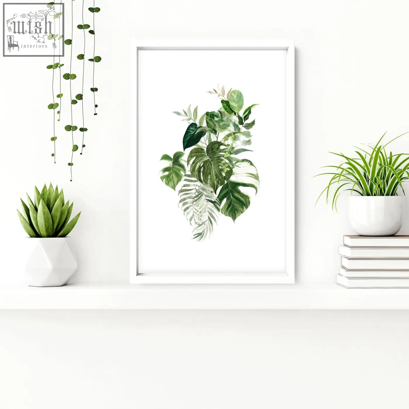 White framed botanical art print with green tropical leaves perfect for bathroom walls and tropical wall prints set