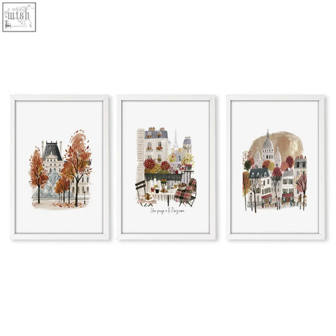 Set of three white-framed watercolor autumn paris prints featuring warm burgundy trees and iconic architecture une pause