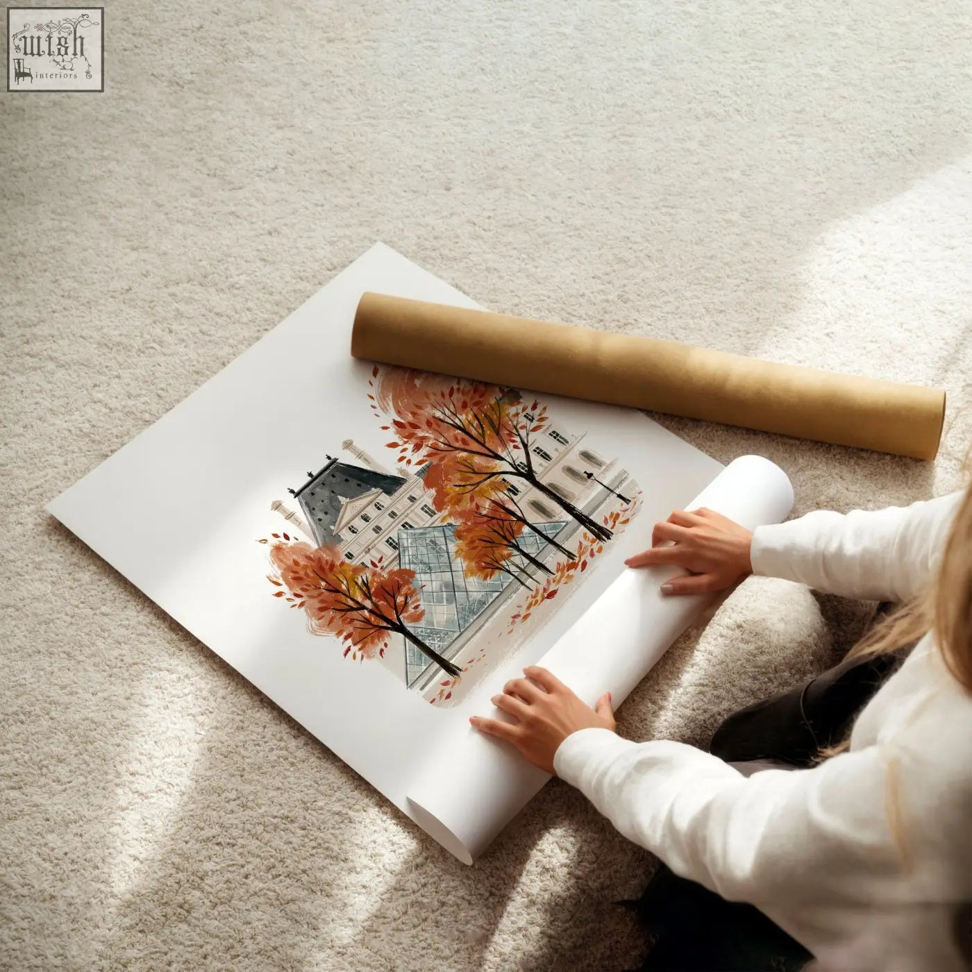 A rolled-up autumn paris travel wall art print on white paper with warm burgundy trees and une pause design