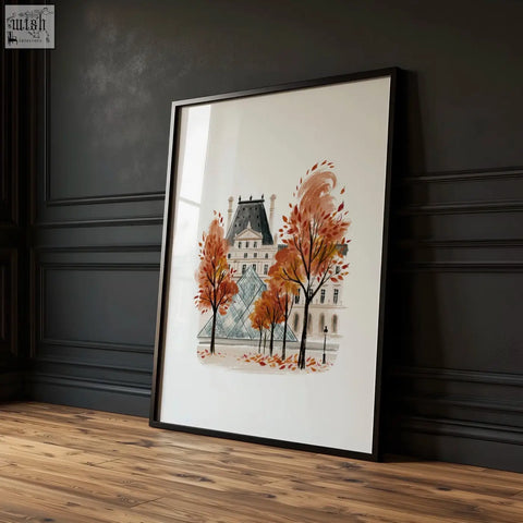 A framed watercolor autumn paris wall art print of the louvre with warm burgundy trees perfect for une pause vibe