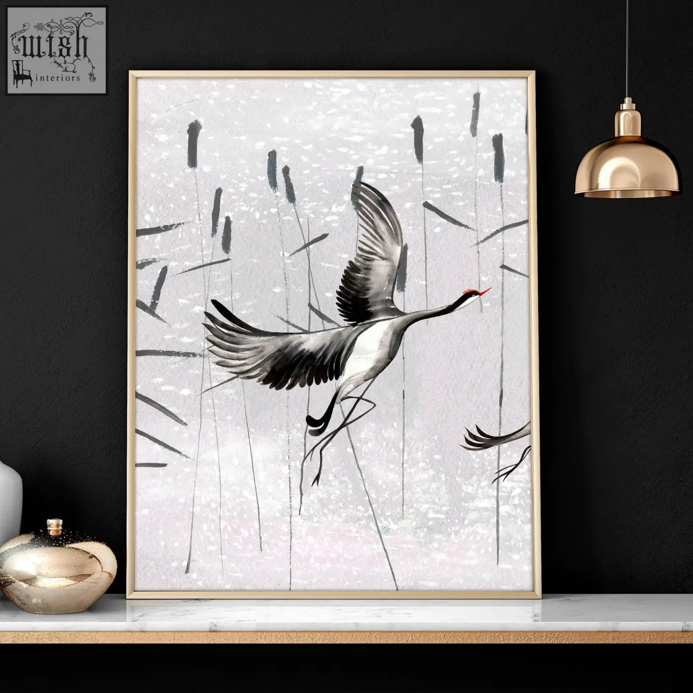 A set of 2 japanese art prints featuring black and white ink-style crane wall art in gold-toned slender frames for bedrooms