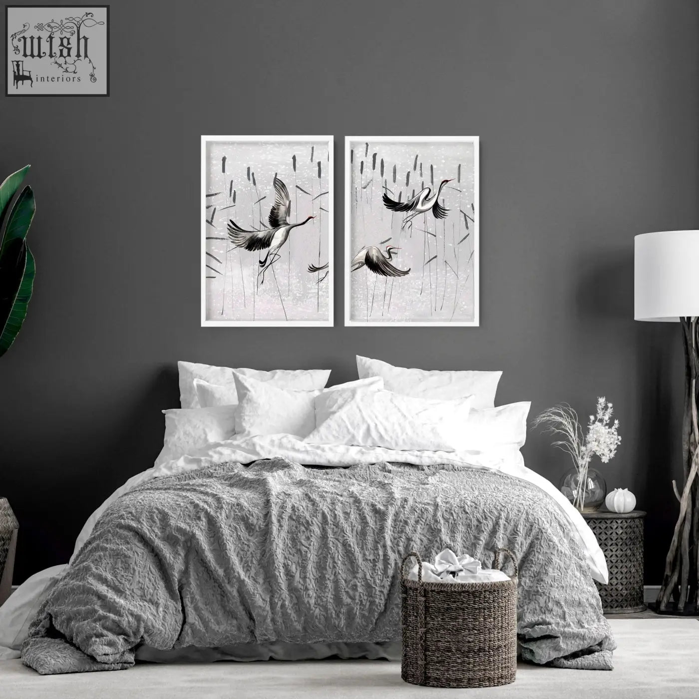 Woven brown basket with handles next to a set of 2 japanese art prints for bedroom wall art decor