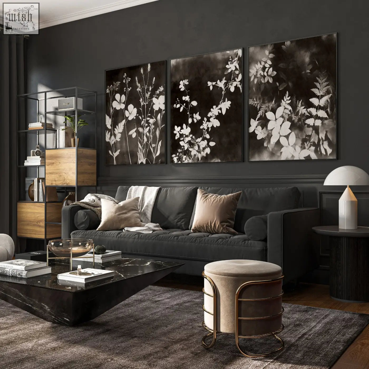 Dark gray upholstered sofa with plush cushions next to mink botanical dark floral wall art prints for living room wall