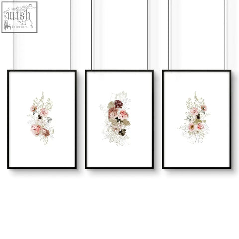 Three black-framed shabby chic wall art prints featuring soft pink watercolor floral designs perfect for kitchen decor