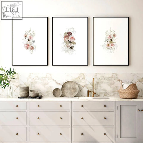 Three shabby chic wall art prints with delicate pink and green watercolor floral designs for kitchen decor
