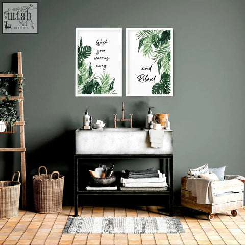 White concrete sink with black metal frame and copper faucet featured in art bathroom wall art prints set