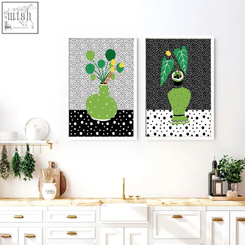 Green polka-dotted ceramic vase with stylized foliage featured in modern kitchen wall art poster prints set of 2