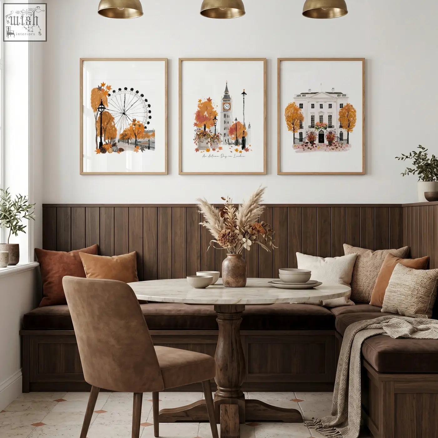 Round marble-top table with dark wood pedestal base in a dining room featuring art london skyline prints