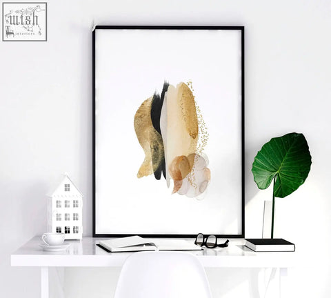 Abstract art prints set of 3 featuring gold beige and black brushstrokes in sleek black frames for modern bedroom decor