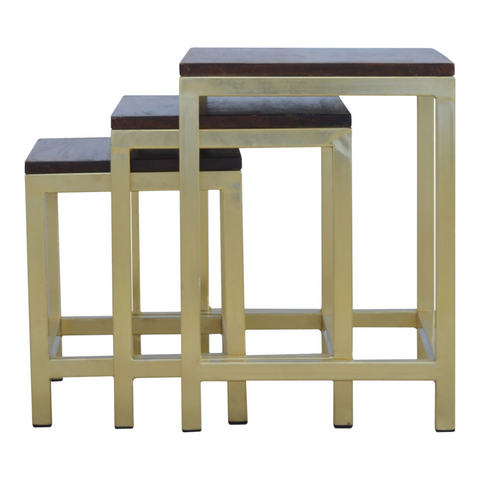 Set of three nesting stools with gold metal frames and dark solid mango wood tops for stylish seating