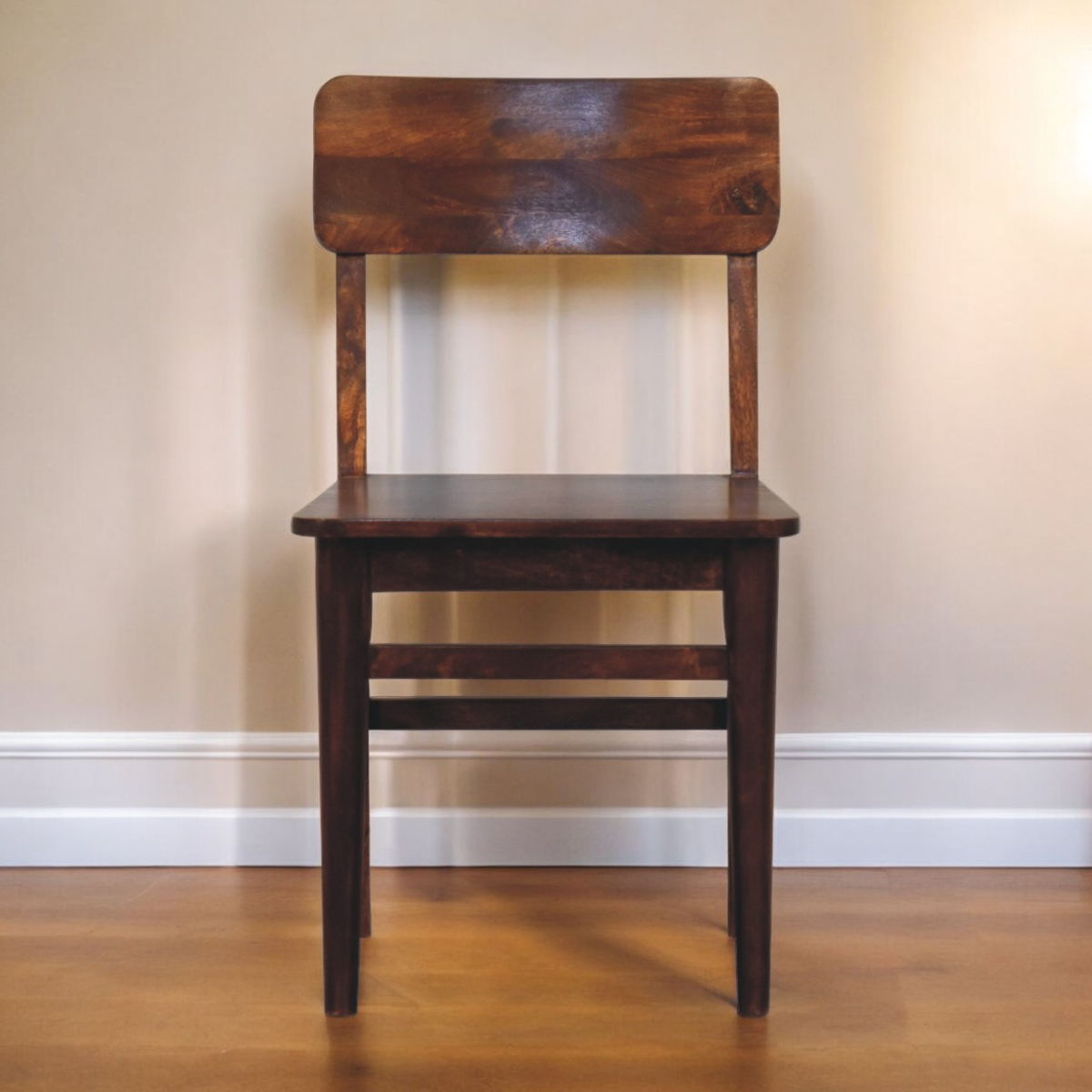 Dark brown solid mango wood classic chestnut dining chair with simple rustic design and visible wood grain