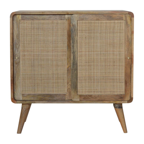 Rustic wooden sliding cabinet with cane panel doors and tapered legs made of solid mango wood