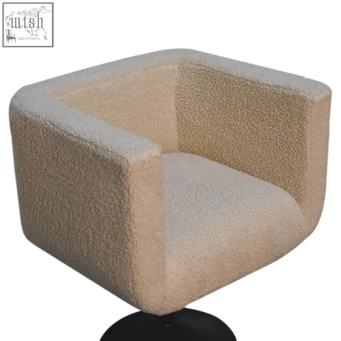Artisan furniture cream boucle swivel chair in beige and light gray with textured upholstery and black swivel base