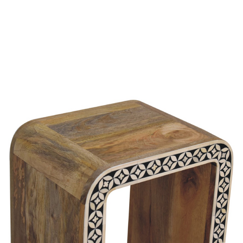 Artisan furniture solid mango wood end table with intricate black and white bone inlay and curved edges