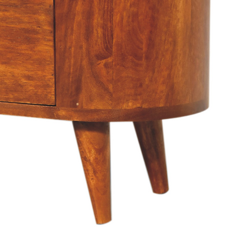 Warm-toned artisan furniture mini chestnut cabinet with curved front and tapered legs made of solid mango wood