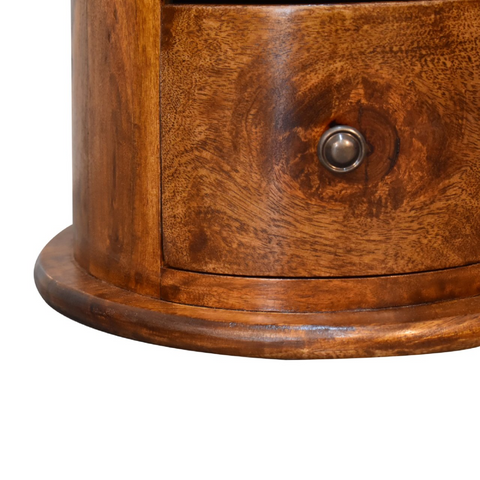 Rich warm-toned solid mango wood drum chest nightstand with curved drawer and metallic knob for artisan furniture