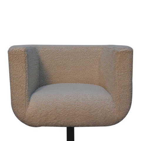 Beige textured upholstered armchair with modern minimalist design featured alongside solid mango wood mokka sideboard