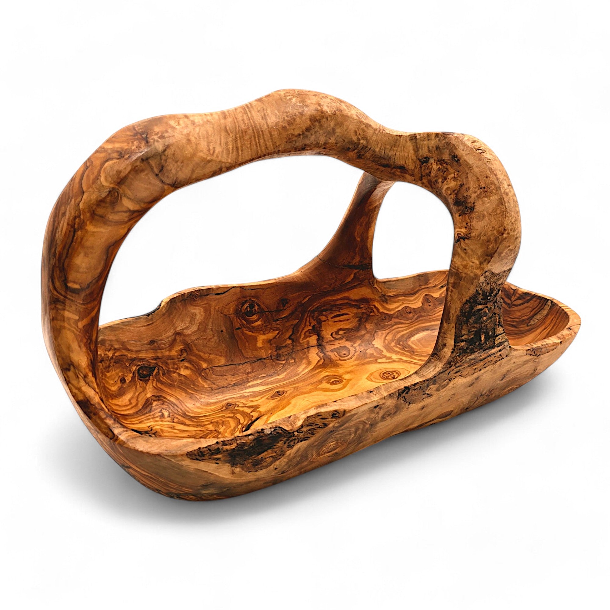 Handcrafted olive wood fruit basket with natural swirling grain and integrated handle perfect for rustic serving caddy
