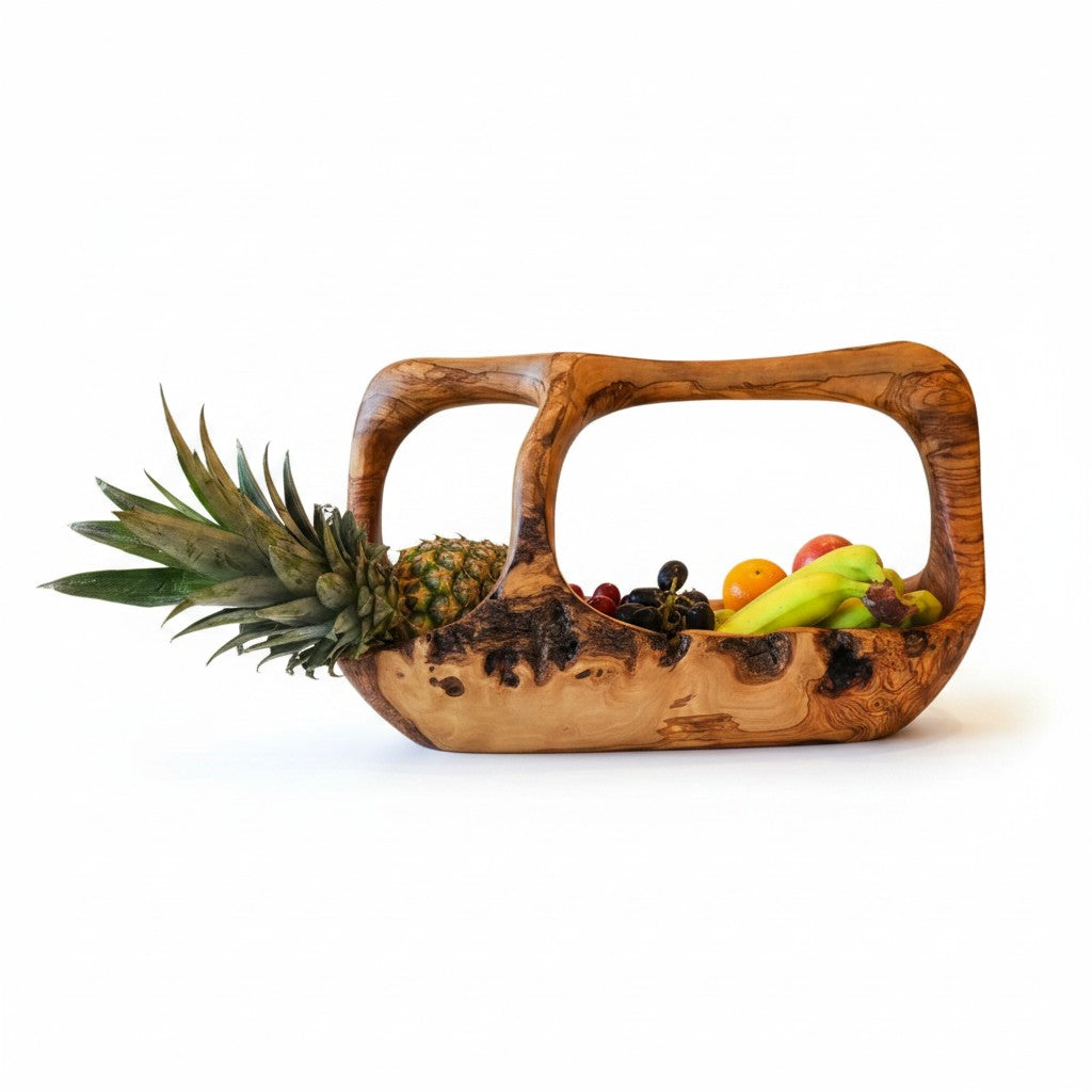 Handcrafted olive wood fruit basket with rustic finish and integrated handle perfect for serving in working days