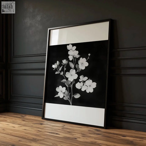 Black-framed art print with white floral design and white bands perfect wall art for kitchen wall in black and white