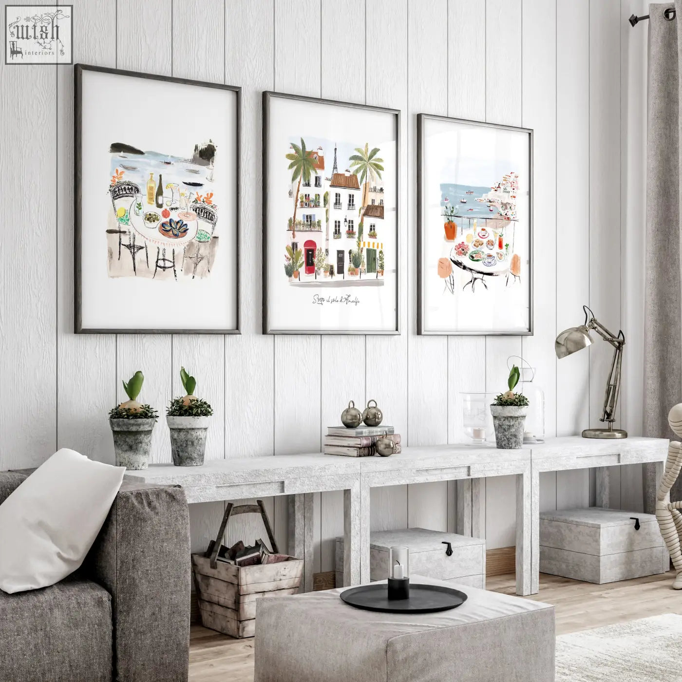 Three framed watercolor prints of parisian scenes titled sotto il sole di amalfi hang on a white wall for living room decor