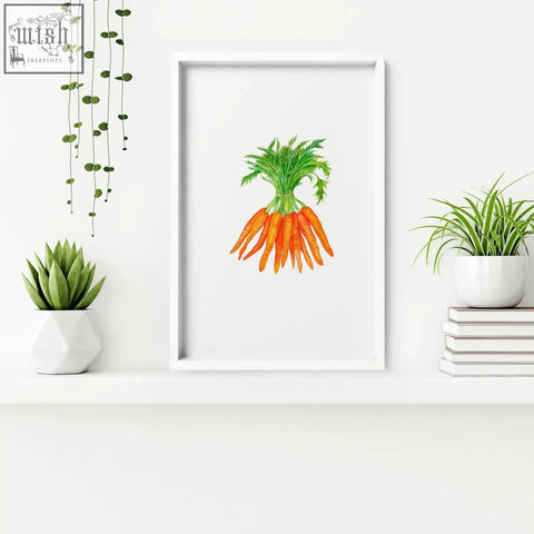 A framed wall art of orange carrots with green tops watercolor illustration perfect for kitchen decor