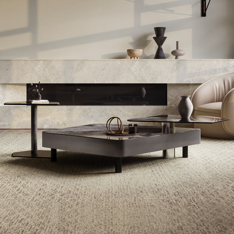 Modern matte black arya nesting coffee table with glass top and sleek metal legs for stylish living spaces