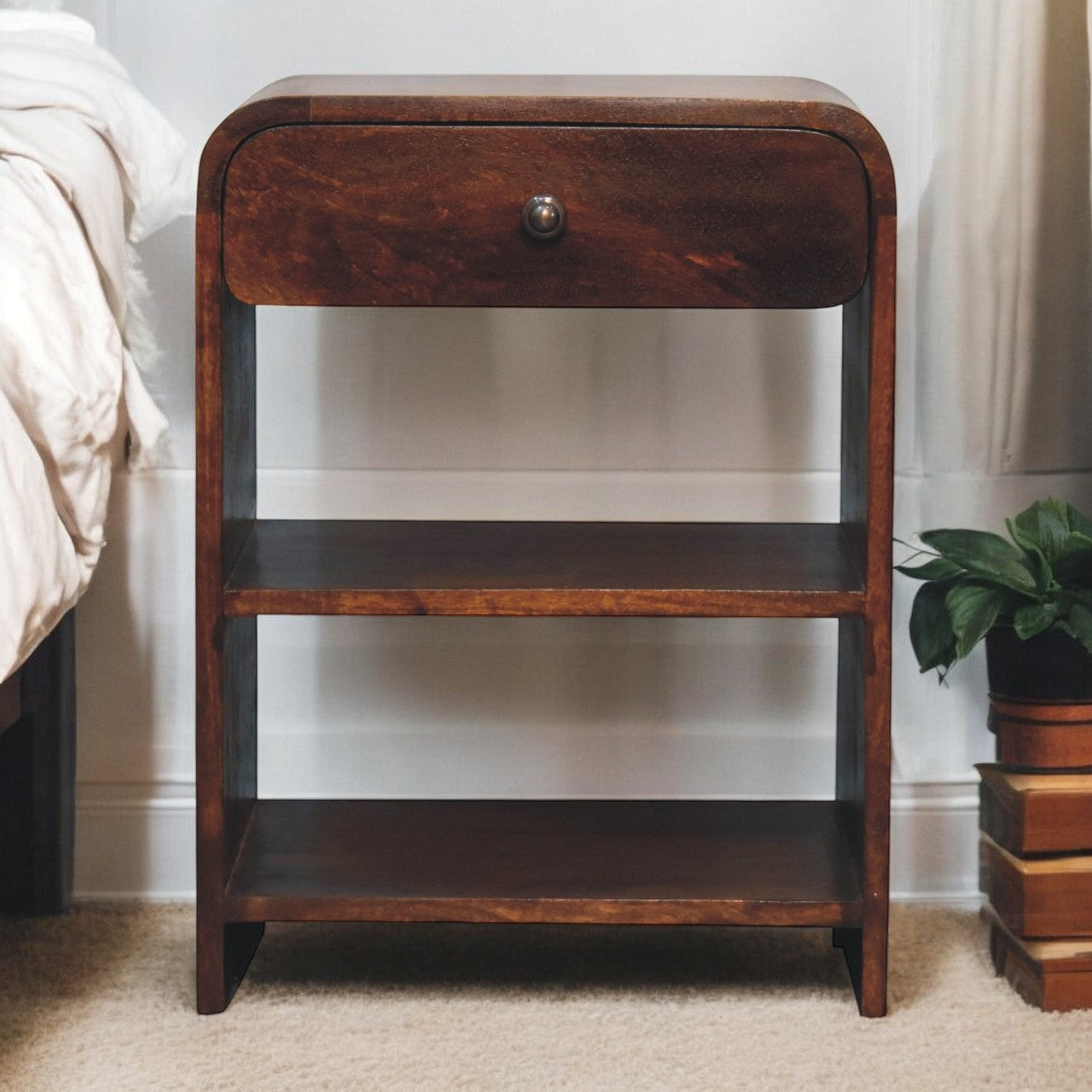 Dark brown mango wood bedside table with single drawer and two open shelves for convenient storage