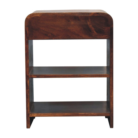 Dark brown mango wood bedside table with three shelves and curved top in chestnut finish for bedroom use