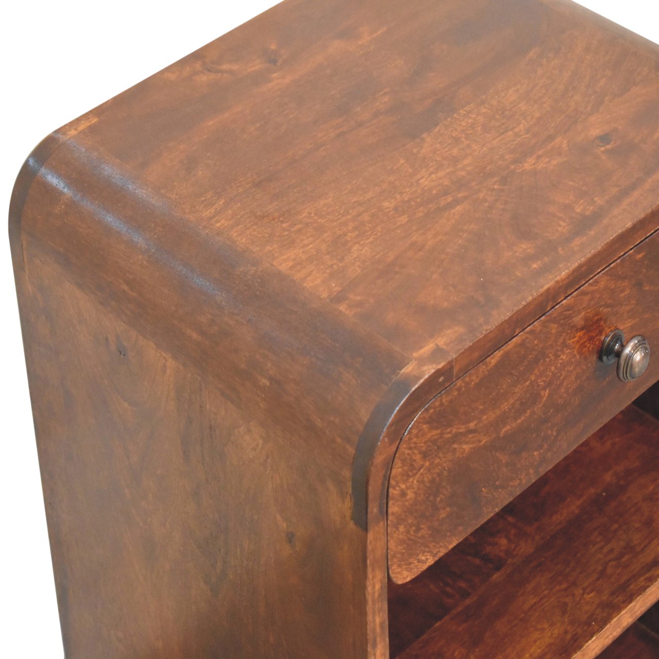 Rich brown mango wood bedside table with curved design and single drawer with metallic knob for bedroom use