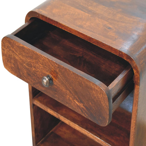 Rich dark brown mango wood bedside table with curved drawer front and metallic knob for bedroom use