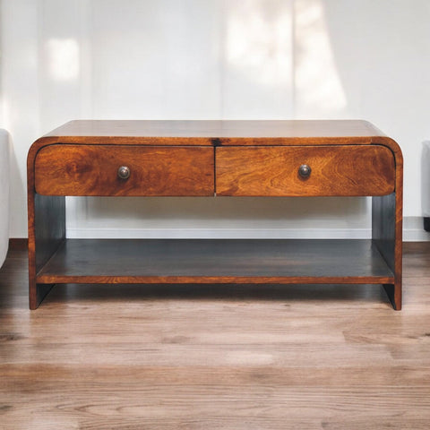 A sleek wooden aspen slim coffee table with curved top two drawers and a lower shelf for extra storage